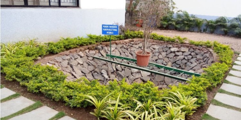 Our sustainability practices include a rainwater harvesting pond at our factory.